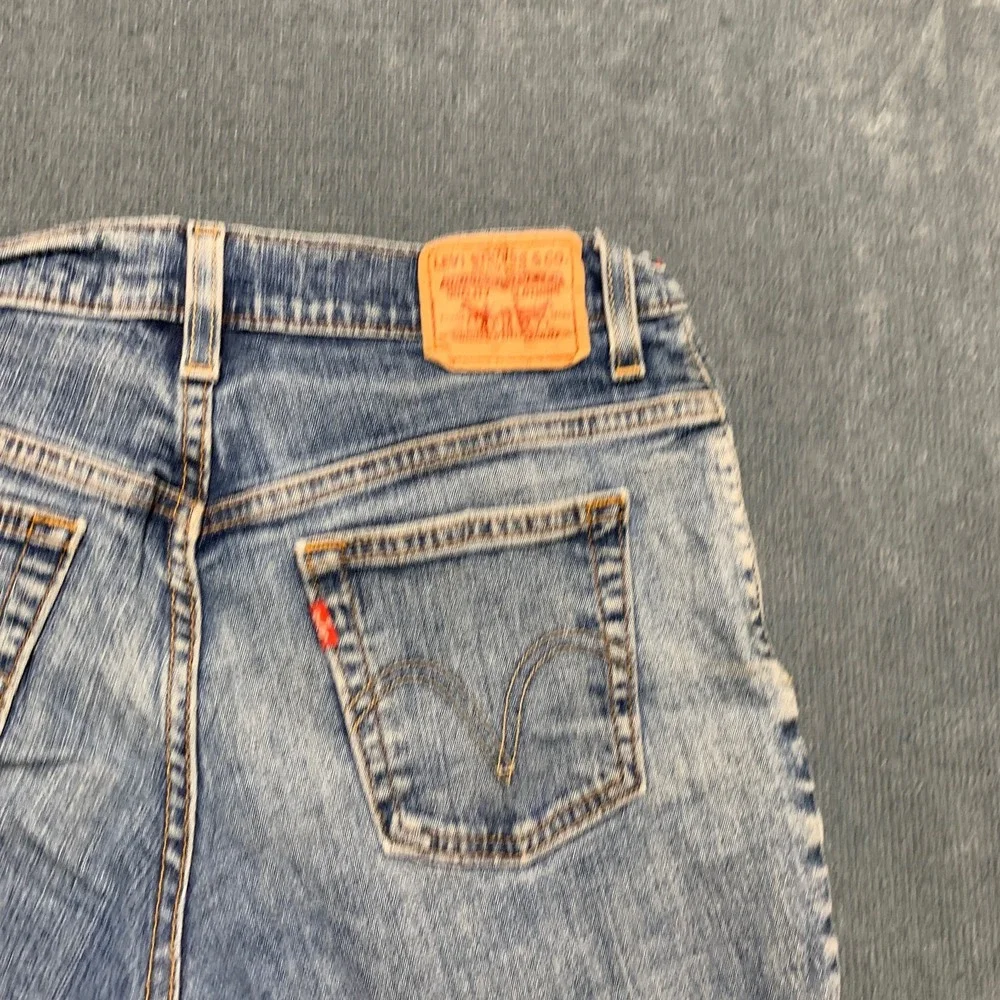Levi's 550 Cut Off Shorts Womens 10M Blue Denim Relaxed Fit Frayed Hem Stretch